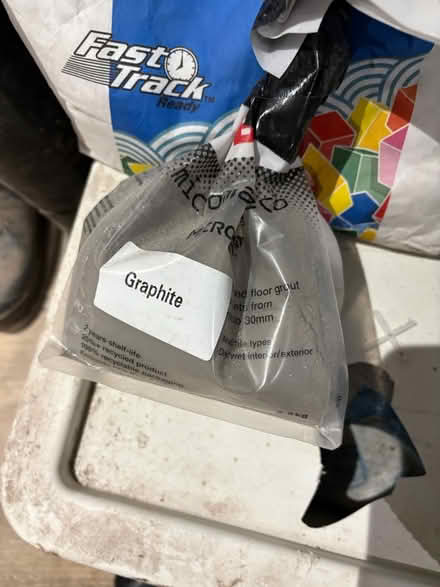 Photo of free Floor grouting (grey) (SW15) #1