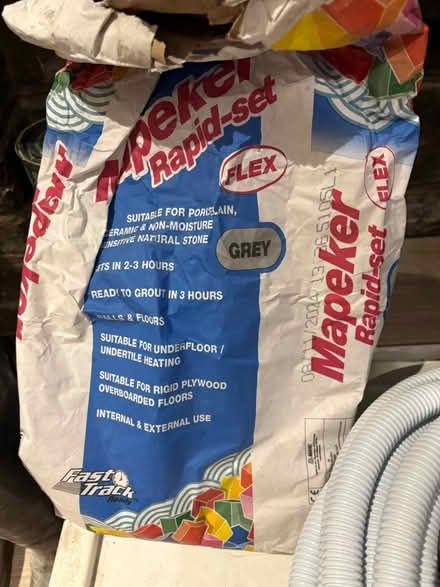 Photo of free Floor grouting (grey) (SW15) #2