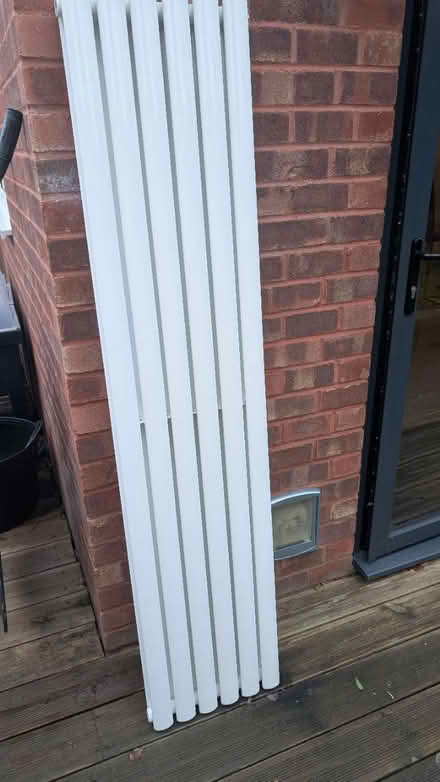 Photo of free Modern vertical double radiator (GU17) #1