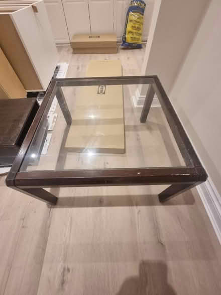Photo of free Wood coffee table with glass top (NW2) #1