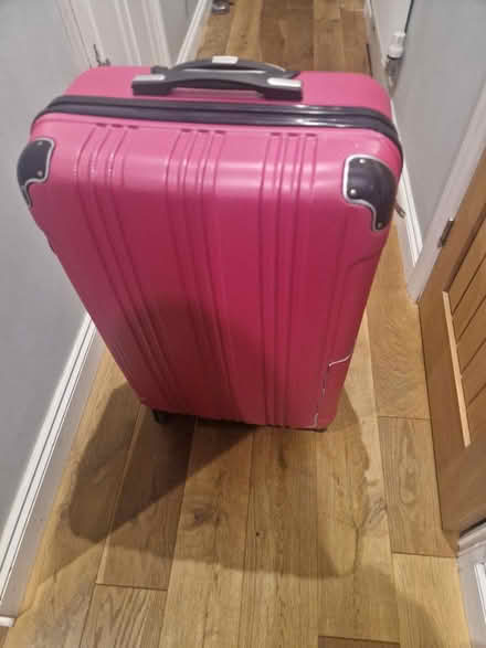 Photo of free Large suitcase**read (Wootton Bedford MK43) #1