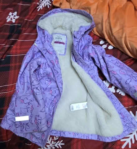 Photo of free Purple Unicorn Jacket (M&S 5-6) (Cumbernauld) #1