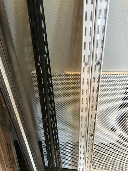 Photo of free 2 pair shelf standards/tracks (San Anselmo near Andronico’s) #1