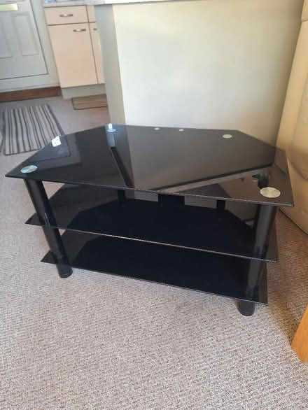 Photo of free Black Glass TV Unit (Woodseats S8) #1