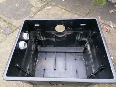 Photo of free Black crate with round holes in (Kendal LA9) #2