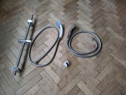 Photo of free Two shower heads, hoses, fittings (Hereford HR1) #1