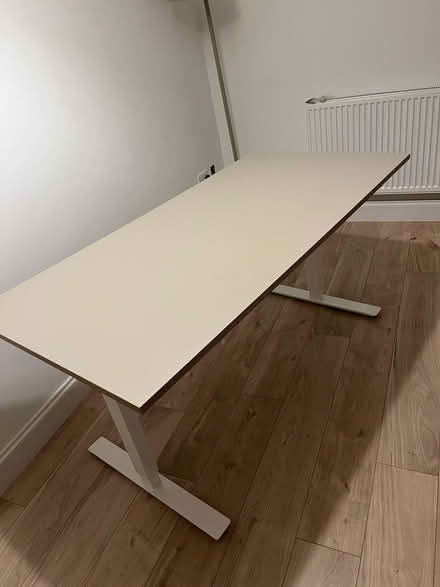 Photo of free Ikea standing desk- small dent (Eltham SE9) #1