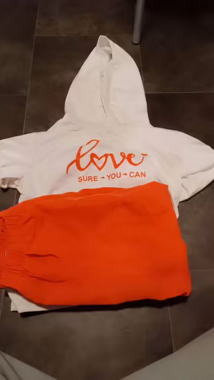 Photo of free Orange and white jumper trousers set 10years (Norcot RG30) #1