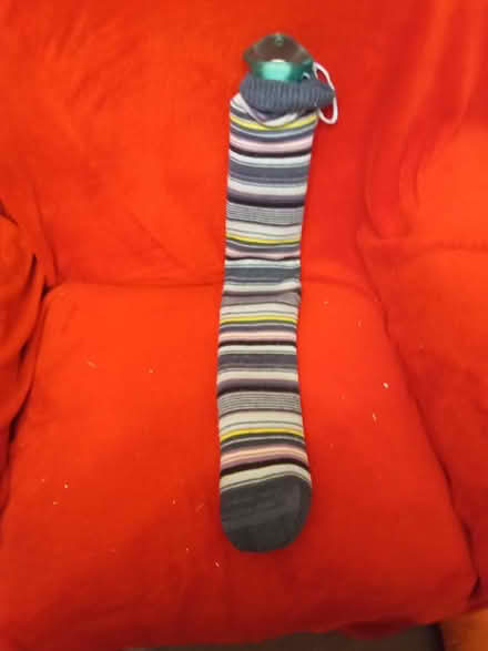 Photo of free Long hot water bottle with cover (Salfords) #1