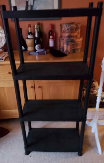 Photo of free Black 4 shelf unit (Potters Bar EN6) #1