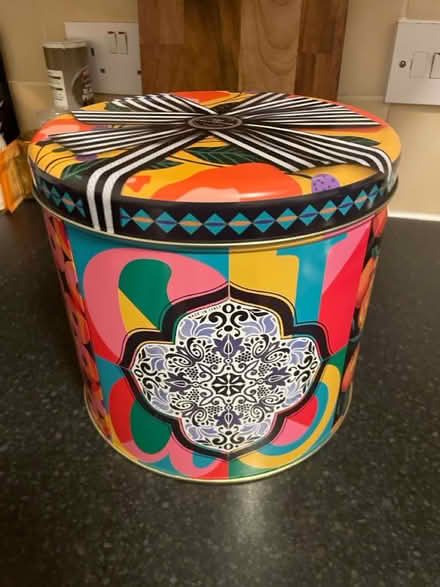 Photo of free Big colourful round tin with lid (L8) #2