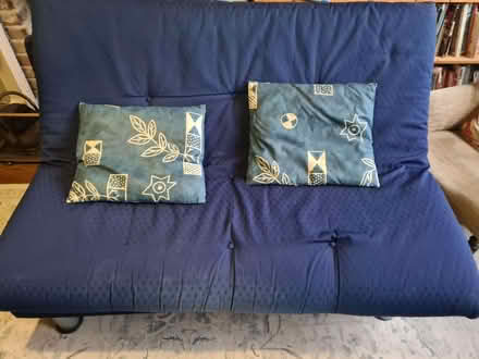 Photo of free Blue futon with metal base (Ham KT2) #1
