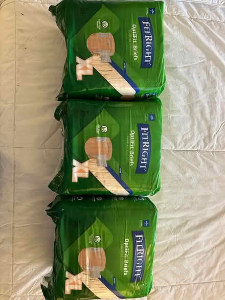 Photo of free 3 sealed packages of XL tab diapers (Bayside, Queens) #1