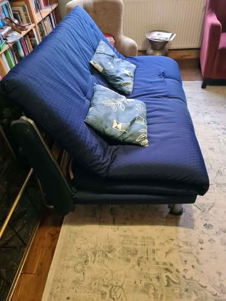 Photo of free Blue futon with metal base (Ham KT2) #2