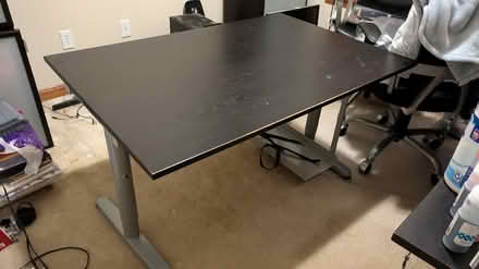 Photo of free Ikea pre loved black desk (North Bothell) #1