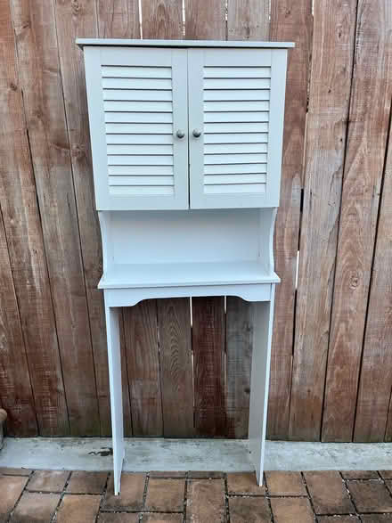 Photo of free Bathroom cabinet for over toilet (200th block off 13Th St SE) #2