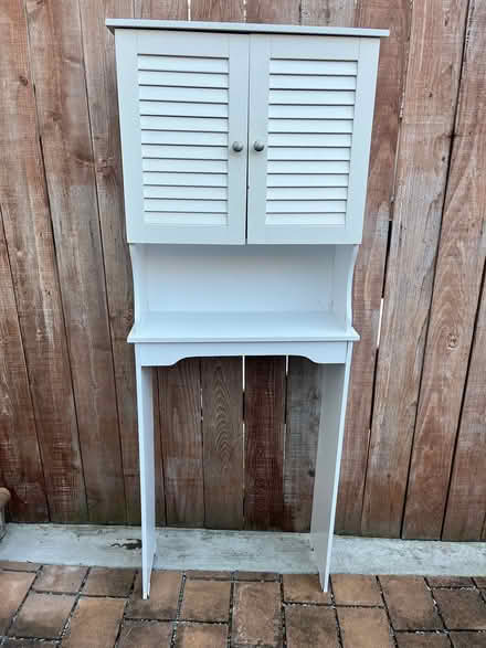 Photo of free Bathroom cabinet for over toilet (200th block off 13Th St SE) #1