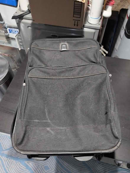Photo of free Black small rolling suitcase (Brentwood) #1