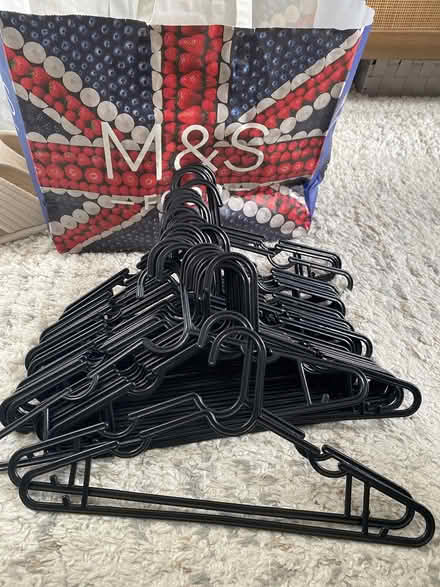Photo of free 30 Black Plastic Hangers (W5) #1