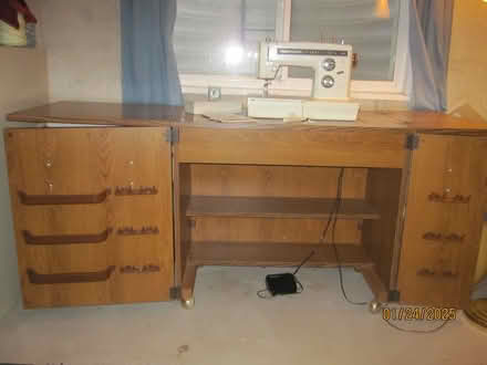 Photo of free Sewing machine and cabinet (South Fort Collins) #1