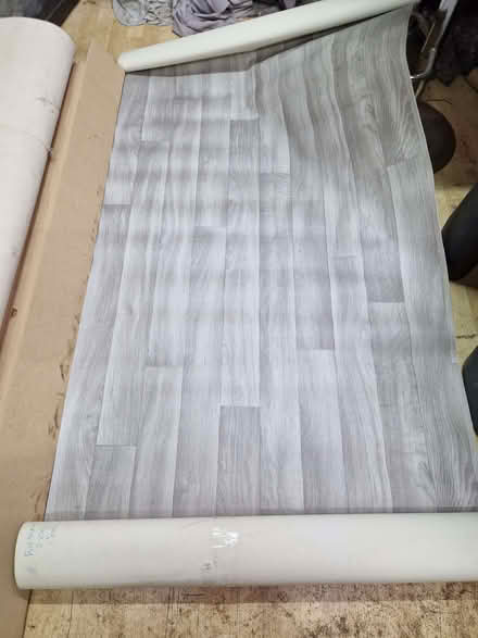 Photo of free Grey wood plank vinyl flooring (Kingsley Park) #1
