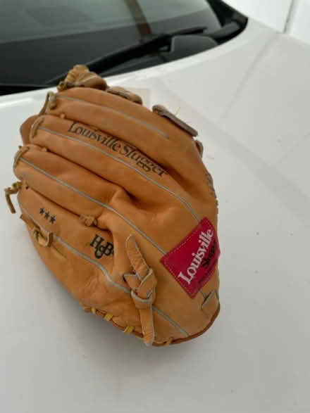Photo of free Louisville Slugger baseball glove (Cr. Valley & golden lantern) #1