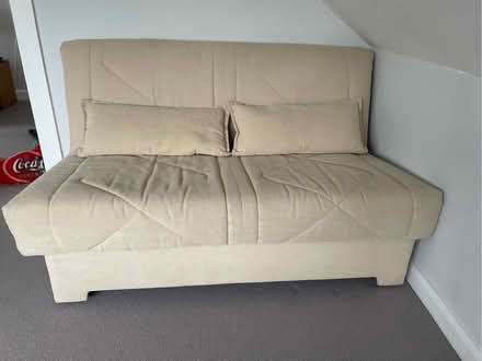 Photo of free Futon sofa (Highway SL6) #1