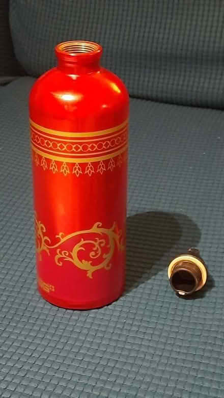Photo of free Large metal Sigg bottle & jacket (Maybury Hill GU22) #1