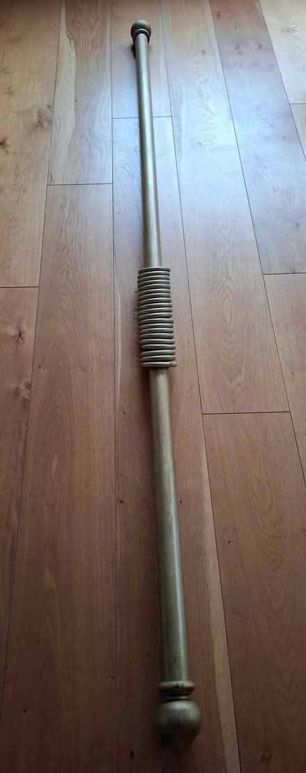 Photo of free Gold painted wooden curtain pole (Wenhaston) #1