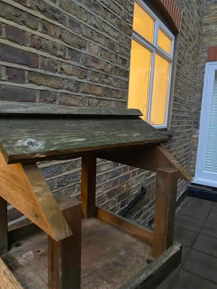 Photo of free Wooden bird table, bird seed, 2 bird feeders (Fulham Palace Rd SW6) #2