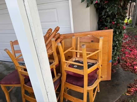 Photo of free Solid wood table with five chairs (Central) #1