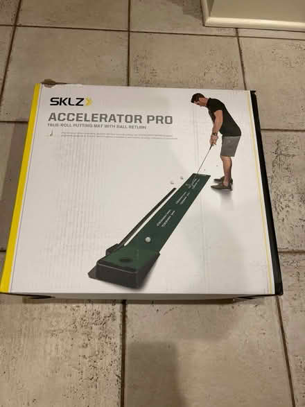 Photo of free Golf putting mat w ball return (NW Evanston) #1