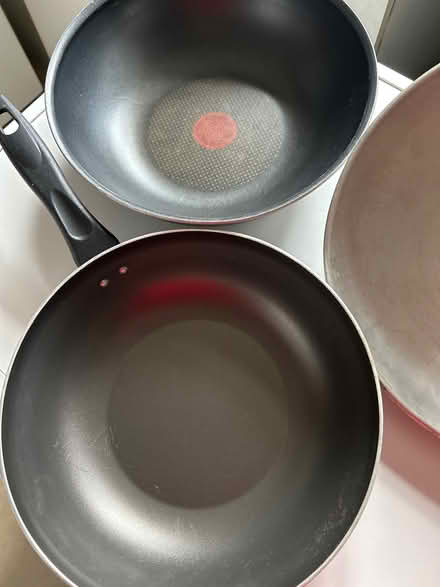 Photo of free 2 wocks non stick one with lid (Leighton Buzzard LU7) #1