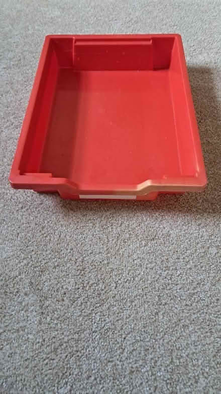 Photo of free Stack of red plastic trays (Bramley LS13) #3