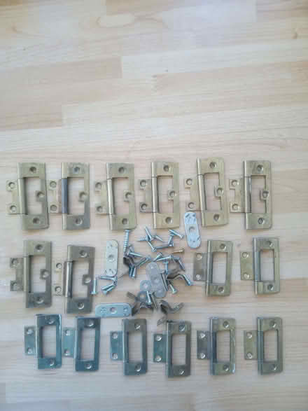 Photo of free Collection of hinges/brackets and screws (Franklands Village RH17) #1
