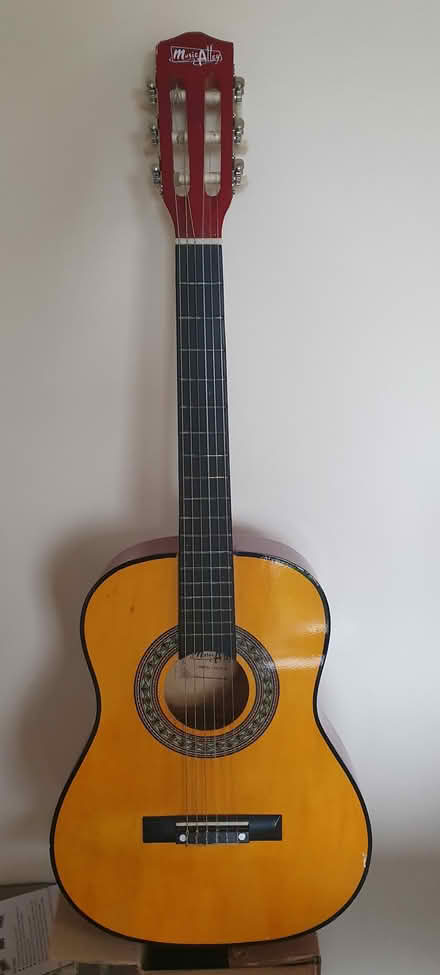 Photo of free Guitar (Denton M34) #1