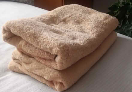 Photo of free two mustard-yellow bath towels (Britannia) #1