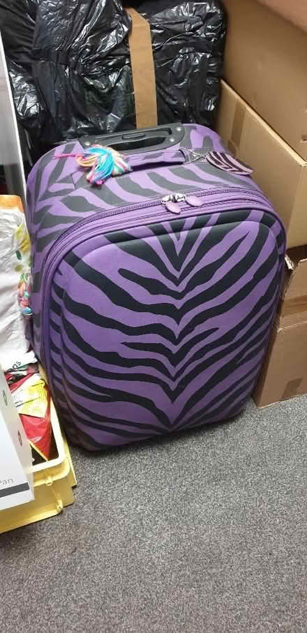 Photo of free Large purple zebra print suitcase. (Chorley Moor PR7) #1