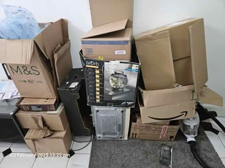 Photo of free Cardboard & old vacuum + microwave (Charlton: Greenwich,London,SE7) #1