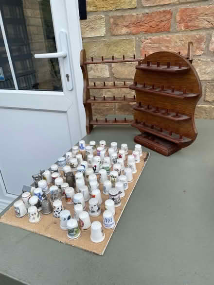 Photo of free 74 thimbles and 2 display stands (Stretham CB6) #1
