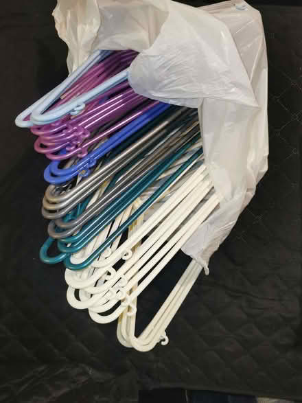 Photo of free 35 Assorted Coat Hangers (Woodcote RG8) #1