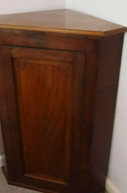 Photo of free Mahogany veneered corner unit (Wigston LE18) #1