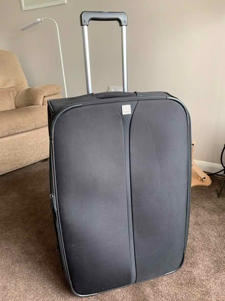 Photo of free Large suitcase (Horley RH6) #1