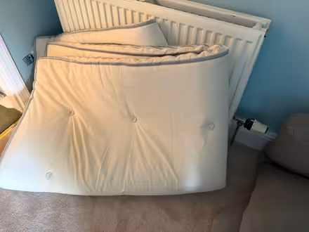 Photo of free Double mattress topper from “futon company” (Freehold LA1) #1