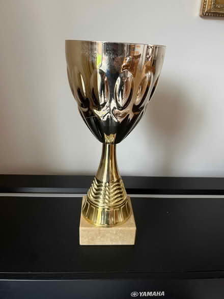 Photo of free Large gold coloured trophy solid base. (Charvil RG10) #1