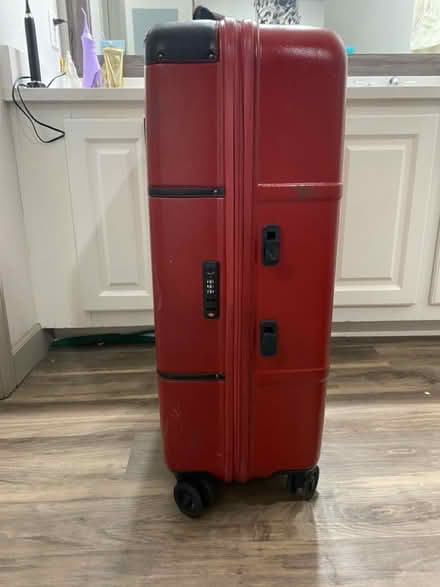 Photo of free Large red suitcase (McCaslin/I-36) #4