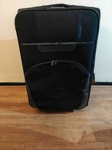 Photo of free Large hush puppies suitcase (Battle RG30) #1