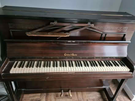 Photo of free Upright piano. A few scratches but great for a beginner (Great Cornard CO10) #1