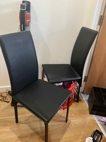 Photo of free 2 leather style chairs (SK1, central stockport) #1