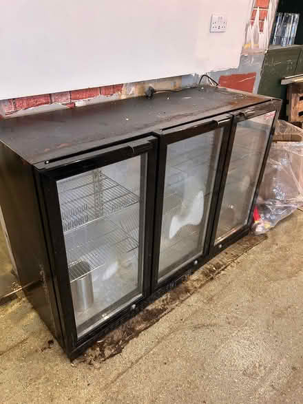 Photo of free 3 door under counter bottle fridge (St John's Hill London SW11 1) #1